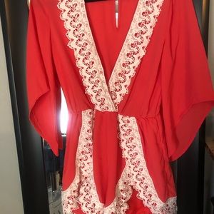 Adorable coral and lace romper